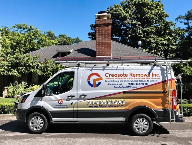 Wallingford Chimney Sweep technician removing creosote safely in Wallingford, CT