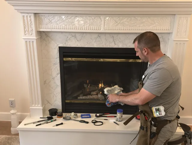 Wallingford Chimney Sweep performing fireplace maintenance in Wallingford, CT